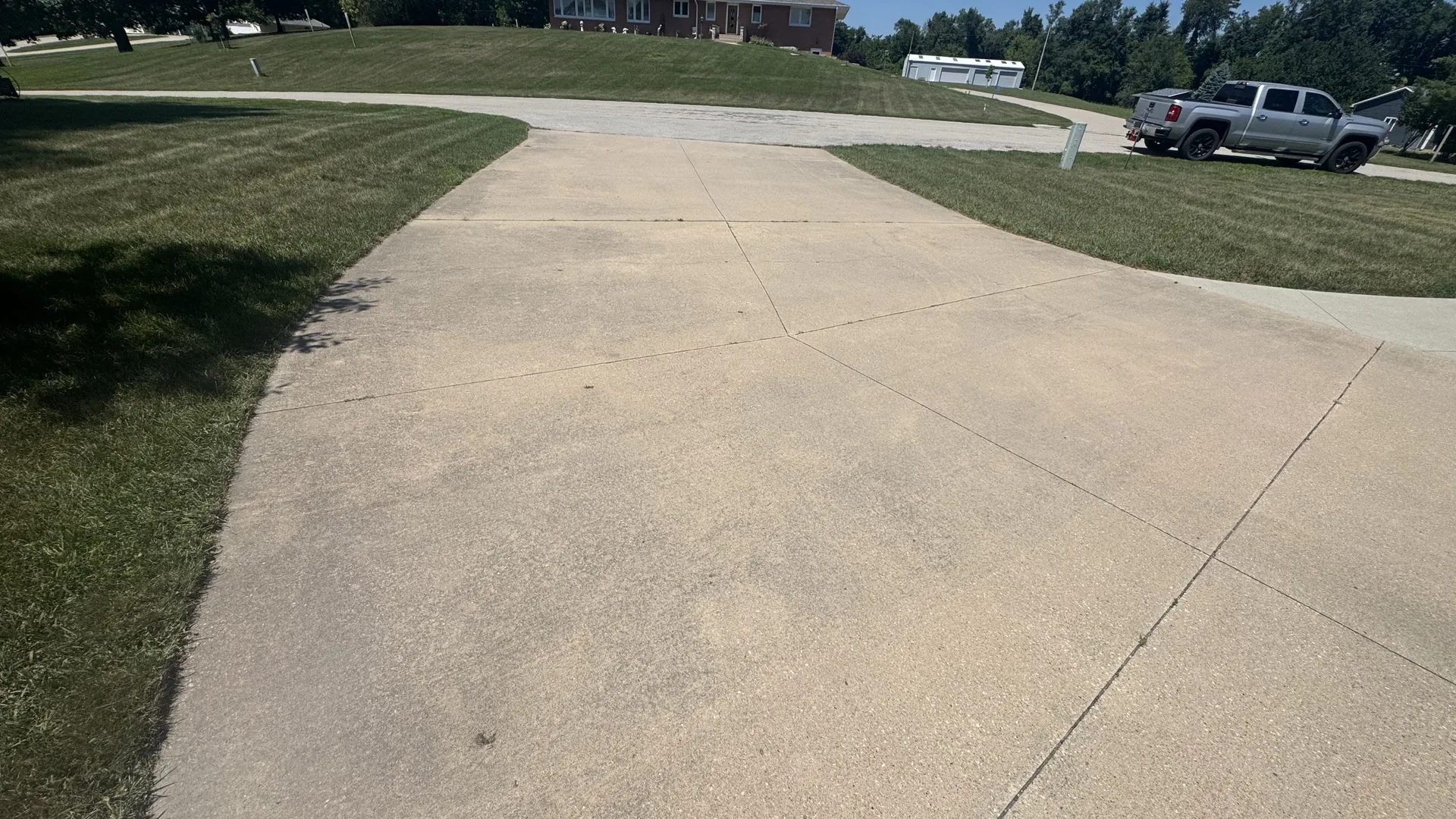 Client driveway before exterior surface cleaning